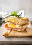 No Washing Up Ham Egg Cheese Pockets - Place ham on a wrap/tortilla, top with a ring of shredded cheese, crack an egg inside, wrap with foil and bake. Voila! A hot breakfast pocket! www.recipetineats.com