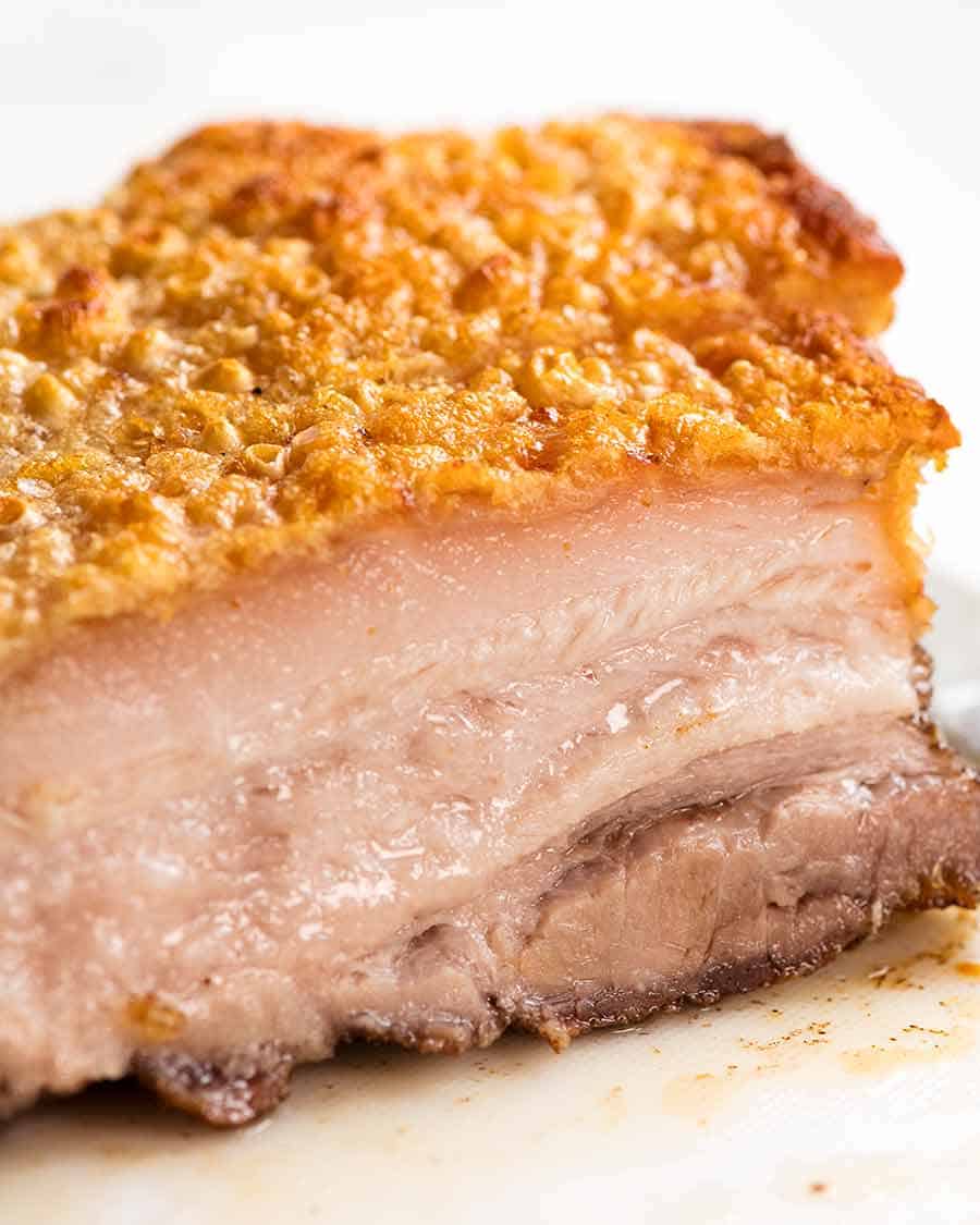 Close up of sliced Chinese Crispy Pork Belly with super crispy perfect crackling