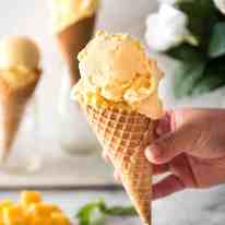 Homemade Mango Ice Cream recipe - Made without an ice cream maker, all you need is mangoes, condensed milk and cream to make this Mango Ice Cream recipe that is truly creamy and scooopable. The real mango flavour is incredible! www.recipetineats.com