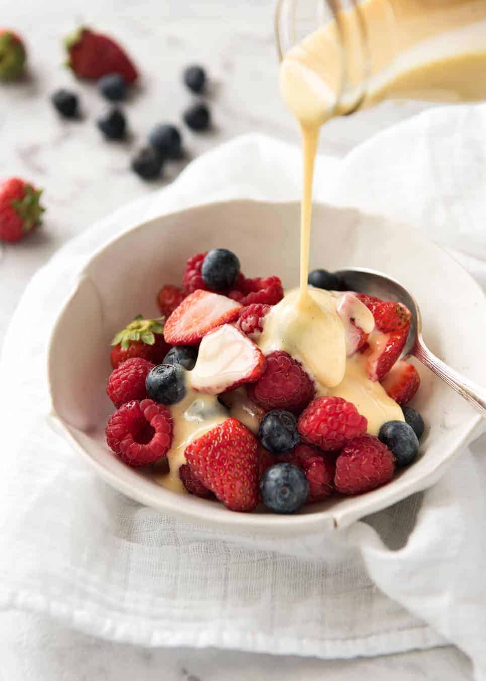A classic, easy custard made using only egg as the thickener, no cornflour. Also known as Creme Anglaise, this is rich and stunning! www.recipetineats.com