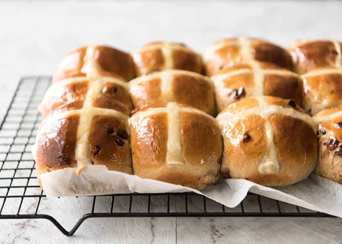 Easy Hot Cross Buns Recipe - perfectly spiced, fluffy and moist, with a no knead, no stand mixer option! www.reciptineats.com