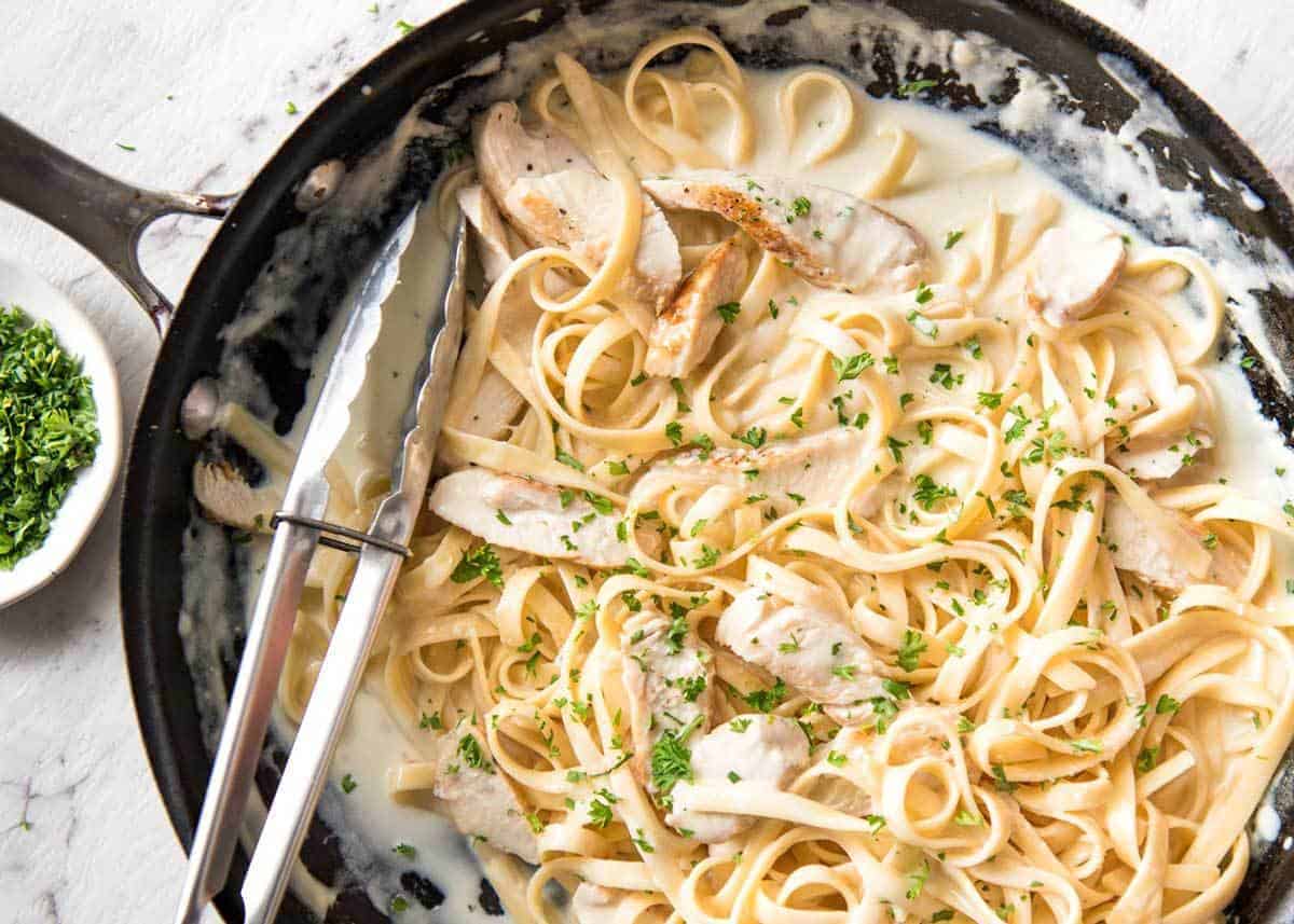 Silky creamy sauce and perfectly cooked pasta, this is the best way to make a One Pot Chicken Alfredo Pasta. No more gluggy sauces and unevenly cooked pasta! recipetineats.com