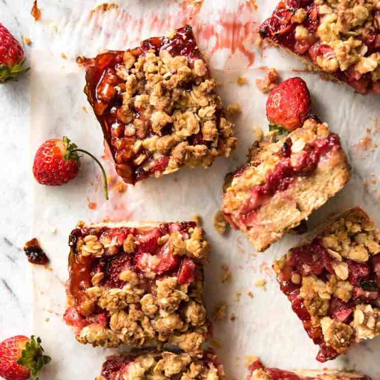 Fresh Strawberry Bars with a buttery biscuit base, topped with jam, caller  strawberries and a crumbly topping. No mixer, speedy  to make! www.recipetineats.com