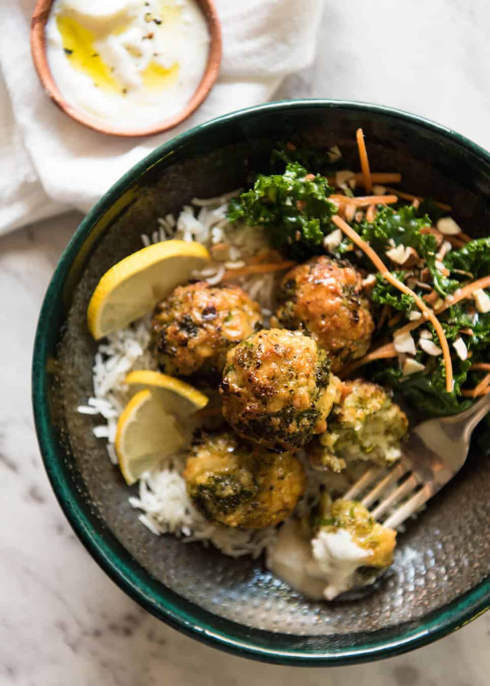 Baked Broccoli Cheese Balls - outrageously delicious as a meal or bites to serve at a gathering! Served with a Yoghurt Lemon Sauce. recipetineats.com