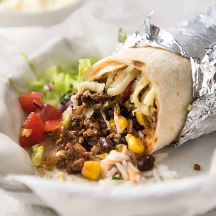 A great everyday Beef Burrito, made with super tasty seasoned beef filling. Fresh and freezable versions! www.recipetineats.com