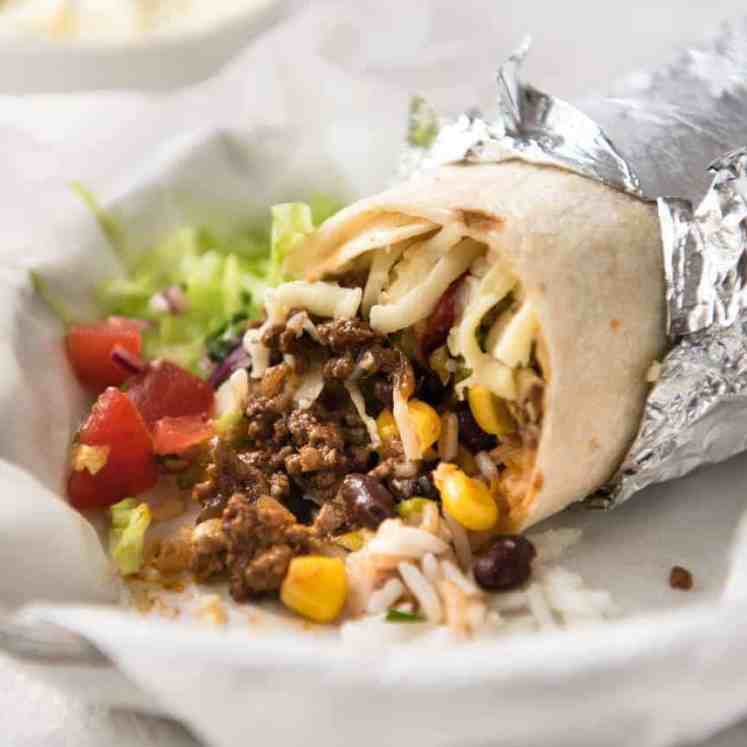 A great everyday Beef Burrito, made with super tasty seasoned beef filling. Fresh and freezable versions! recipetineats.com
