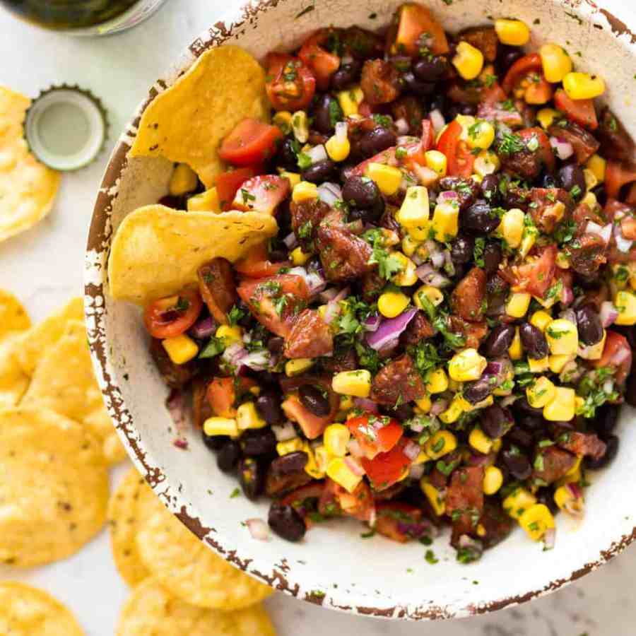 I call this a PIG OUT Salsa. Sensible people would call it an Chorizo, Black Bean and Corn Salsa. :) recipetineats.com