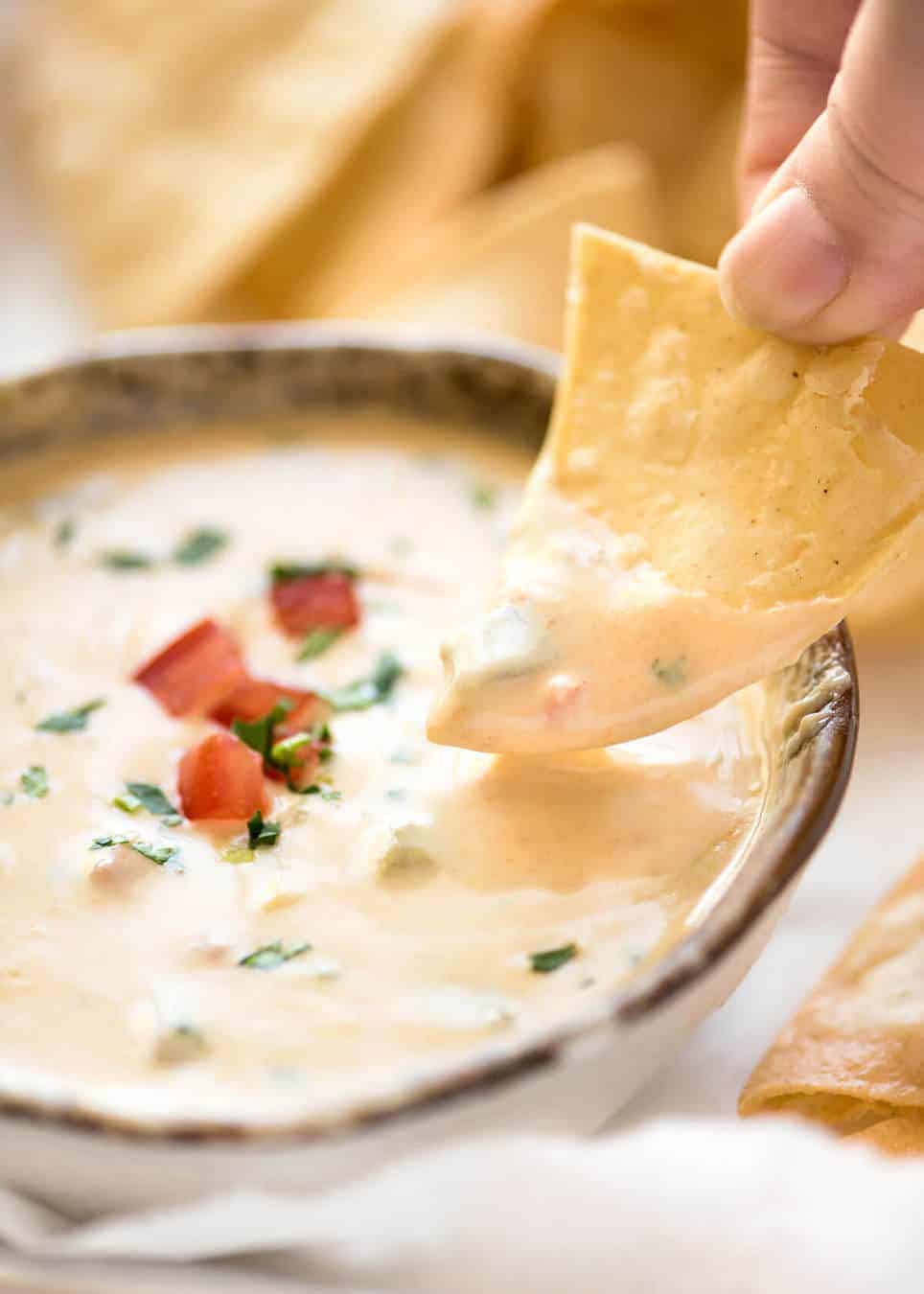 Code cracked: Queso Dip made with real cheese that's ultra silky even when it cools. recipetineats.com