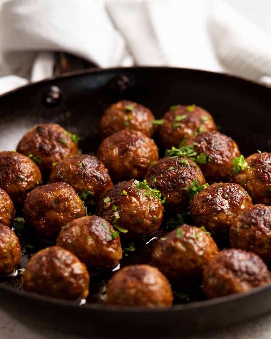 Freshly cooked Moroccan lamb meatballs in a skillet