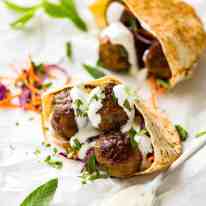 Plump, juicy, beautifully spiced Moroccan Lamb Meatballs with Minted Yoghurt. Great for stuffing in pita pockets! recipetineats.com