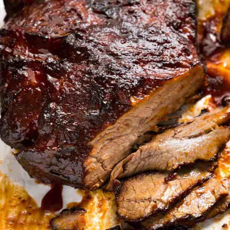 This is the stuff food dreams are made of - ultra tender Slow Cooker Beef Brisket with a homemade BBQ Sauce. Quick and easy prep, incredible flavour! recipetineats.com