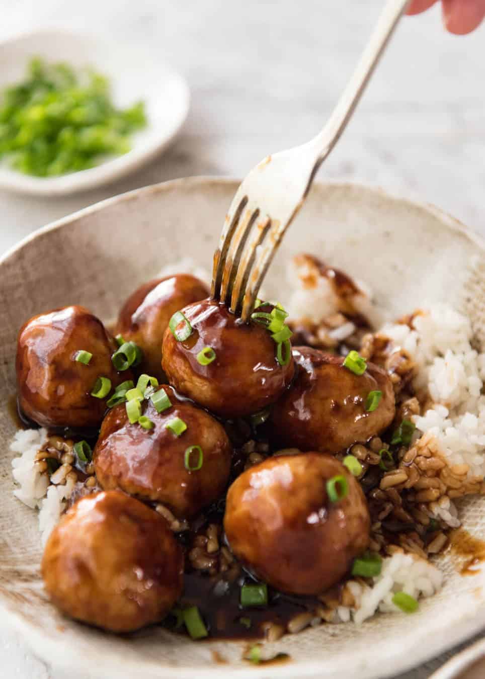 If you love juicy, plump chicken meatballs and Teriyaki sauce, you will go mad over these Teriyaki Chicken Meatballs! recipetineats.com