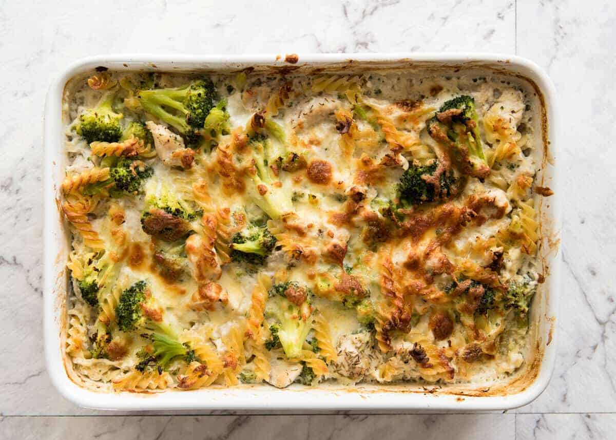 This is how to make a HEALTHY Creamy Pasta Bake in one baking dish, from scratch. Loaded with broccoli, 5 minutes prep then just pop it in the oven. This Ultra Lazy HEALTHY Creamy Chicken Pasta Bake is magical! recipetineats.com
