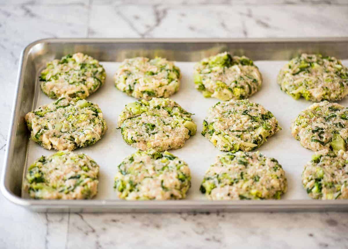 Golden and crispy on the outside, juicy and cheesy on the inside - BAKED Cheesy Broccoli Chicken Patties. recipetineats.com