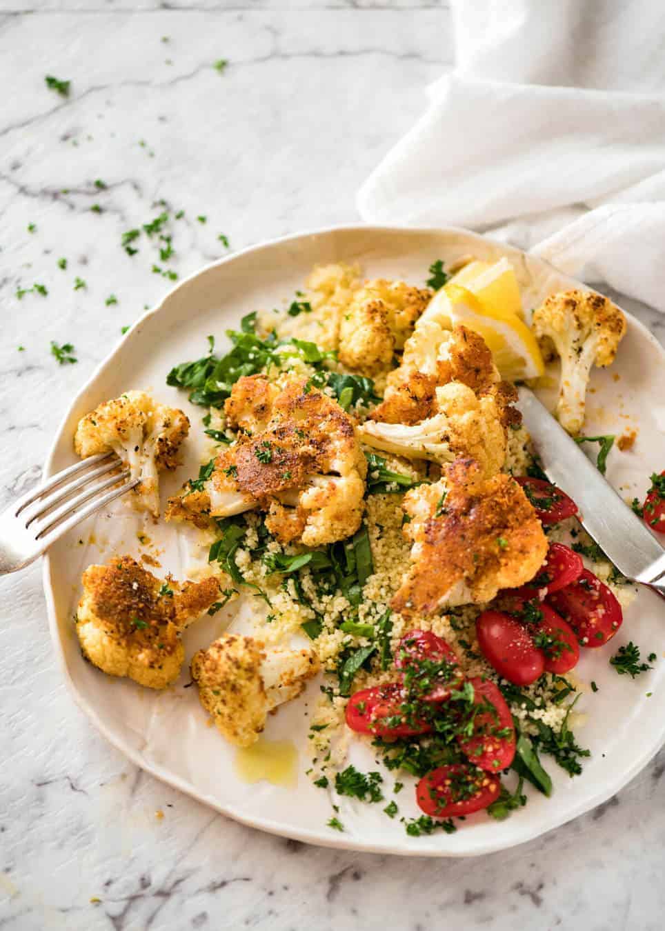 Try this Roasted Parmesan Crusted Cauliflower for dinner tonight! Serve it as a side or as a main meal, or how about as a healthy, low carb snack at a gathering? It's quick, easy and off-the-charts delicious! recipetineats.com