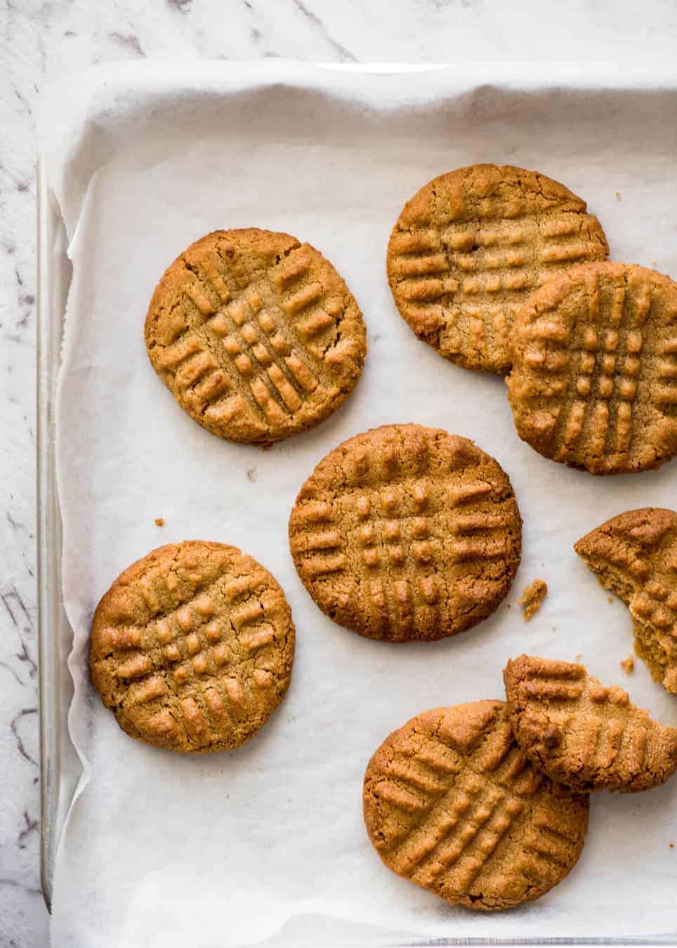 The World's Best Easy Peanut Butter Cookies are SOFT and CHEWY. Peanut butter, brown sugar and egg is all you need! www.recipetineats.com