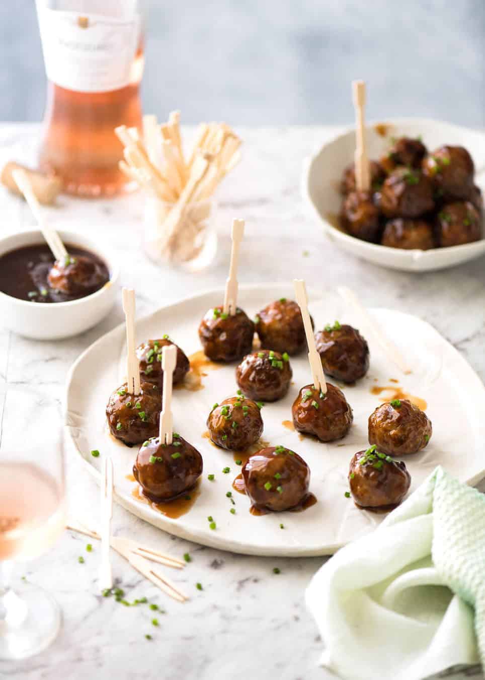 Plump, juicy and soft, these Party Cocktail Meatballs are baked and served with a fabulous Sweet & Sour Dipping Sauce that's super quick to make. Great make ahead for parties! www.recipetineats.com