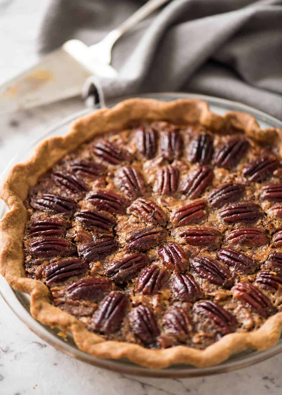 Learn how to make Pecan Pie, the great American classic! Flaky all-butter pie crust with a soft set filling, the quick video tutorial will be very helpful will guide you to nail this every time! recipetineats.com