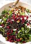 This Wild Rice Salad is a salad for celebrations! Stellar flavour combination - wild rice, pomegranate, pecans, rocket / arugula, green onions, cranberries and feta. recipetineats.com