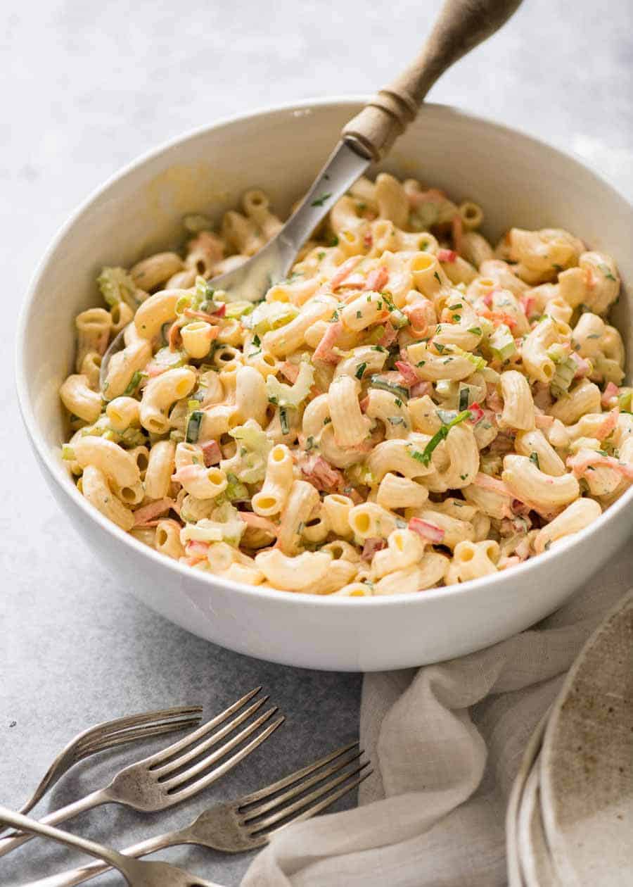 Macaroni Salad with Creamy Dressing in a white bowl, ready to be served.