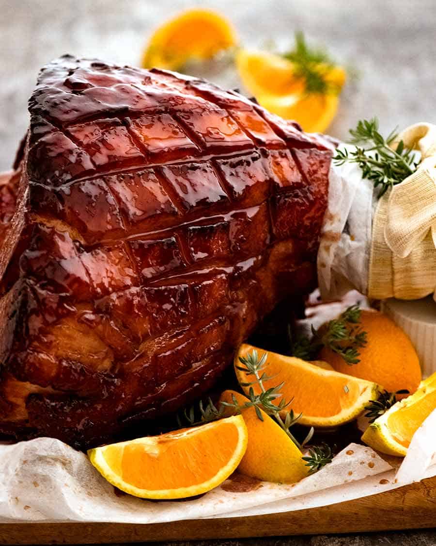 Maple Ham Glaze - glazed ham om a platter, ready to be cared