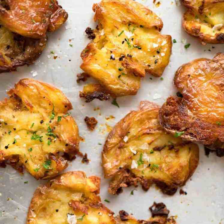The best, buttery, golden, ultra crispy smashed potatoes you will ever have! recipetineats.com