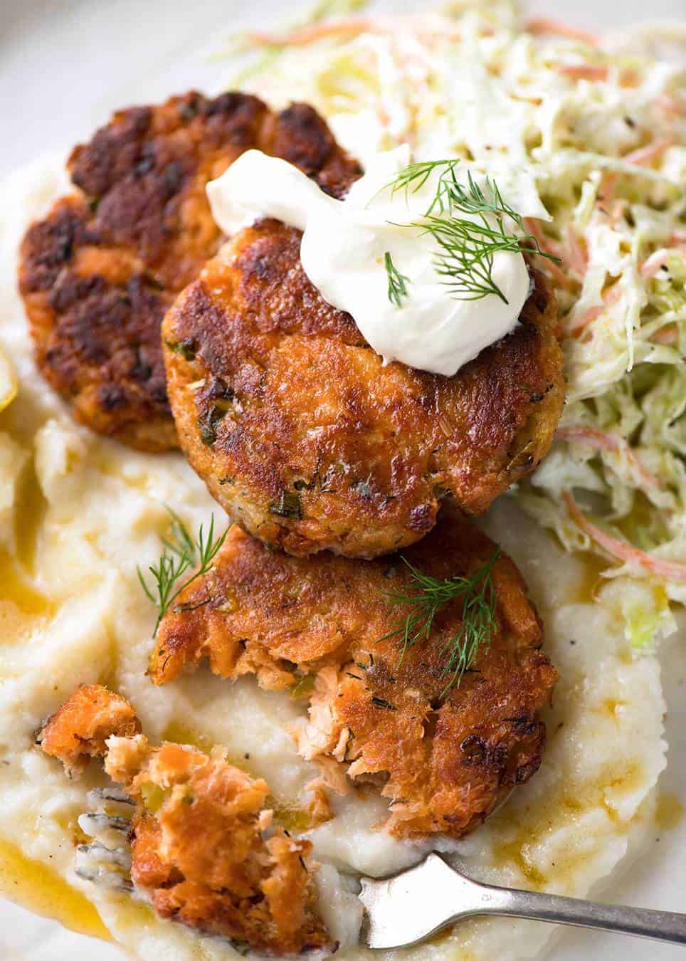 Tender insides studded with flakes of salmon, golden on the outside, these Salmon Patties are baked, not fried. Ultimate transformation of canned salmon - or use fresh! recipetineats.com