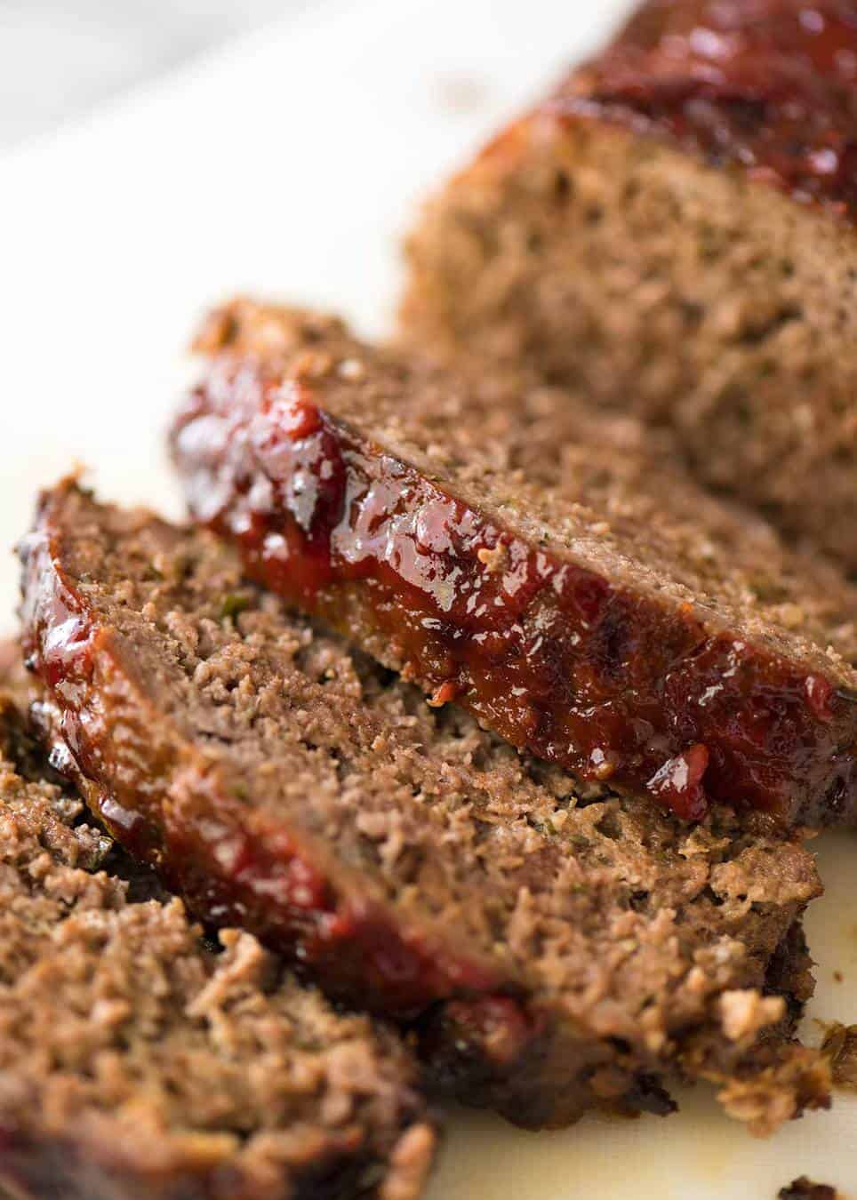 Meatloaf is so much more than a giant hunk of ground beef in a loaf shape. It should ooze with flavour, be moist and tender yet not crumble apart when sliced. www.recipetineats.com