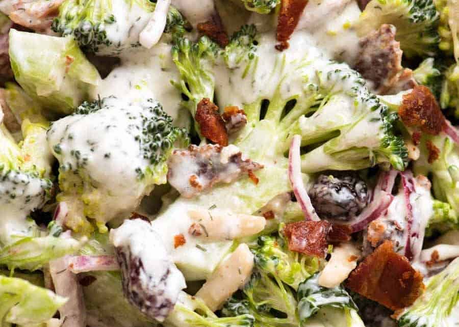 Close up of Broccoli Salad with Lighter Creamy Dressing with bacon, almonds, cranberries and red onion