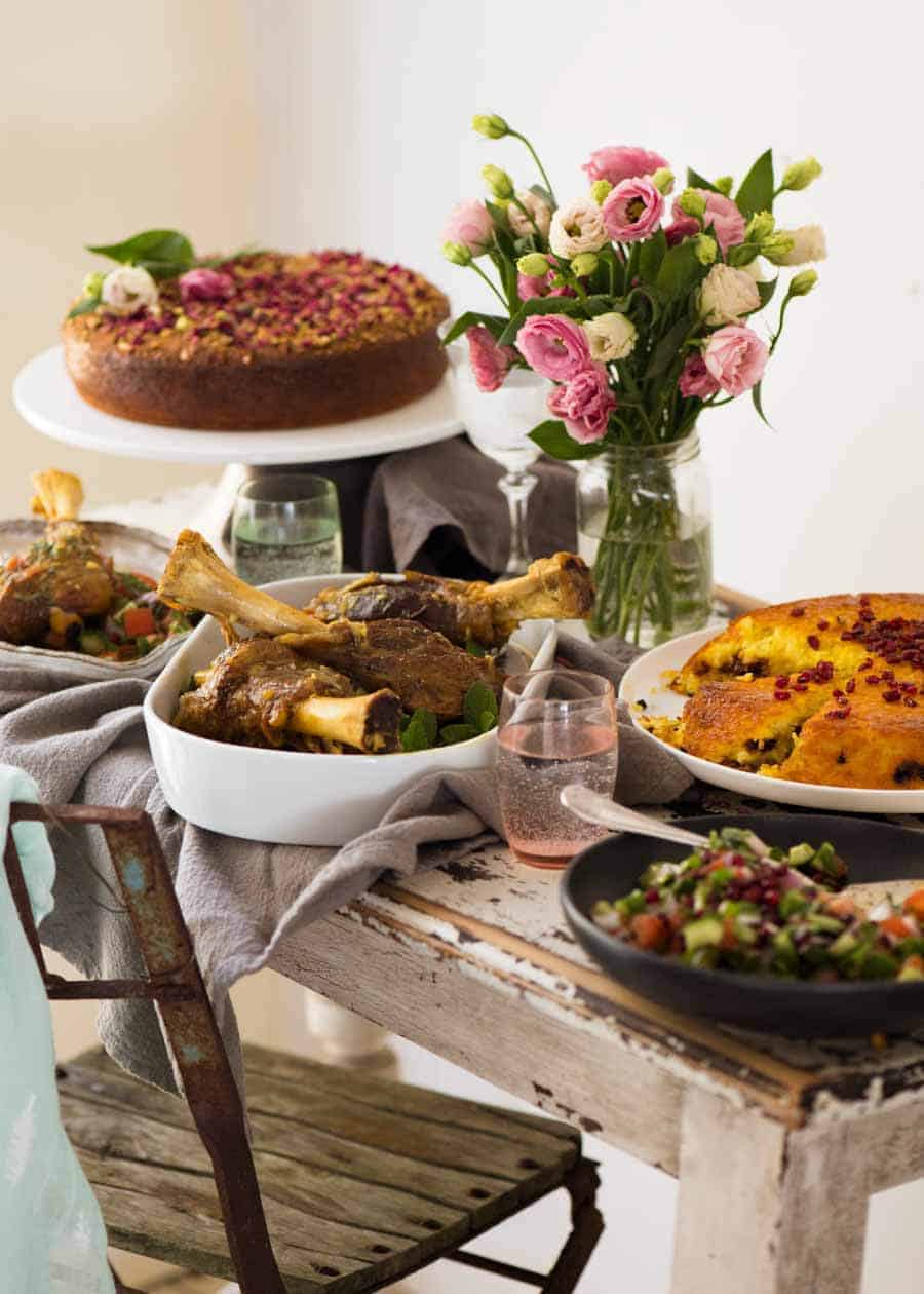 A table filled with Persian dinner recipes for Persian Feast week