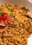 Close up of Tomato Basil Rice in a white bowl, ready to be served