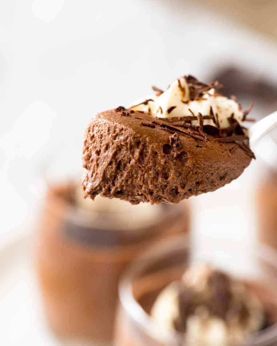 Close up of spoon holding a scoop of Chocolate Mousse