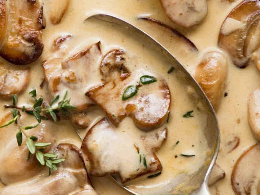 Close up of Creamy Mushroom Sauce garnished with thyme
