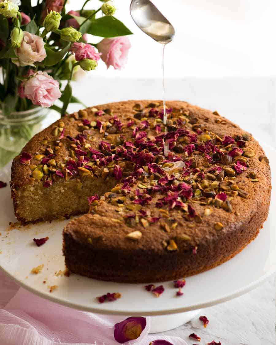 A beautiful Persian love cake (gluten free) made with semolina and almond flour soaked in lemon syrup with an optional touch of rose water.
