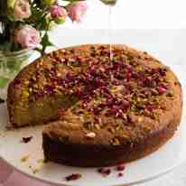 A beautiful Persian Love Cake (gluten free) made with semolina and almond meal soaked with a lemon syrup with a touch of optional rosewater.