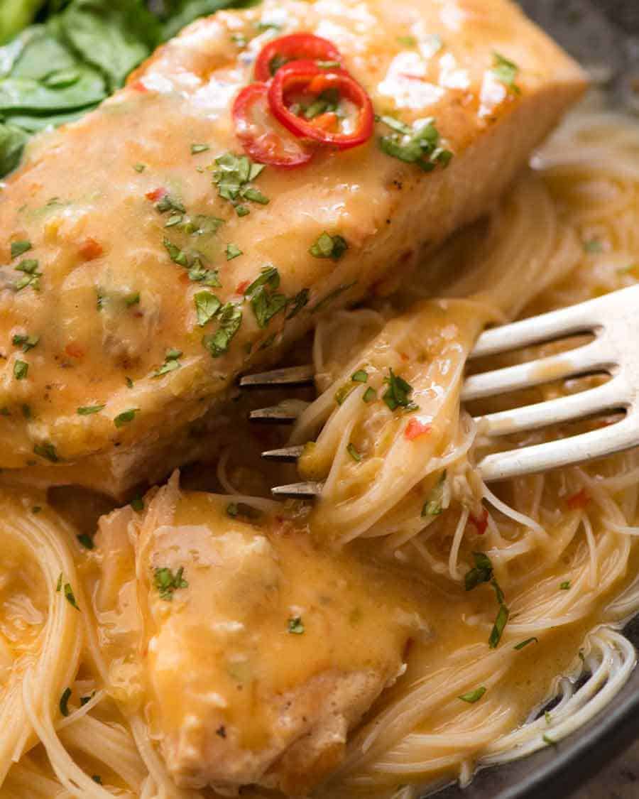 Close up of fork picking up vermicelli noodles smothered in Coconut Lime Sauce
