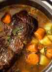 Slow Cooker Pot Roast in a slow cooker, ready to be eaten