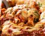 Close up of serving Baked Ziti fresh out of the oven