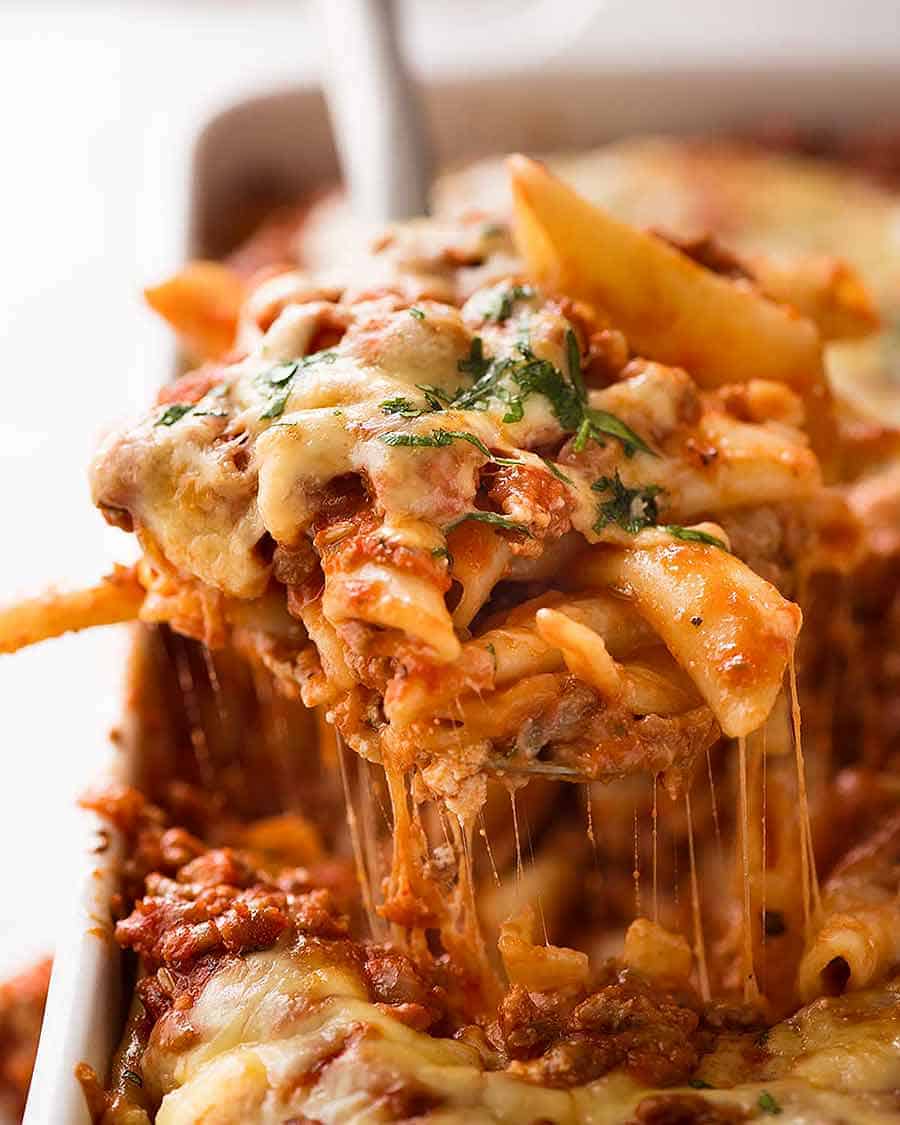 Baked Ziti in a white baking dish, fresh out of the oven.