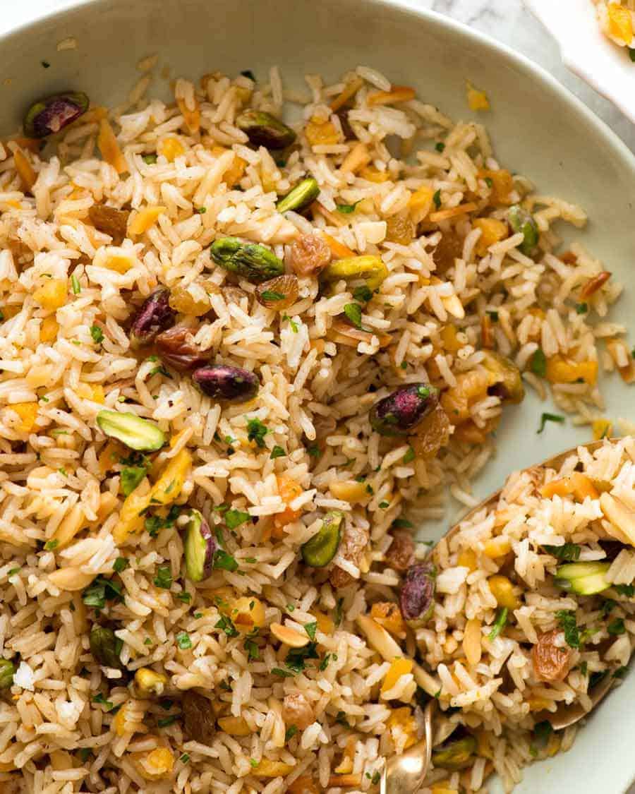 Close up of Rice Pilaf in a green bowl, ready to be served