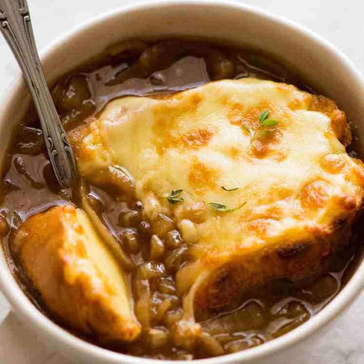 Close up of French Onion Soup with cheese toast