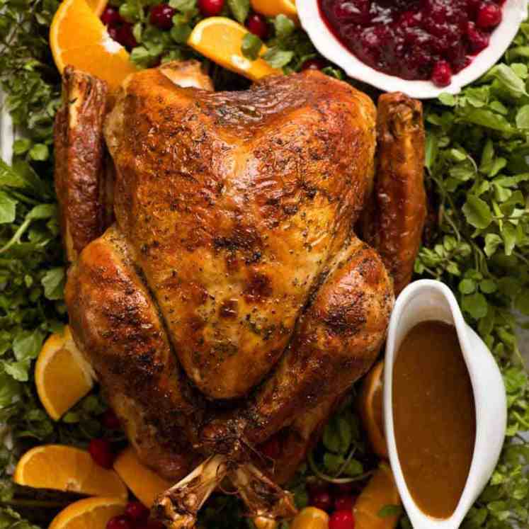 Juicy Roast Turkey decorated on platter