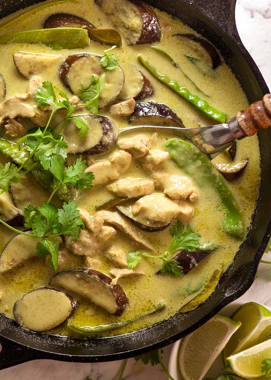 Thai Green Curry in a black skillet, fresh off the stove