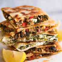 Stack of Gozleme with Spinach and Feta, spiced Lamb or Beef filling