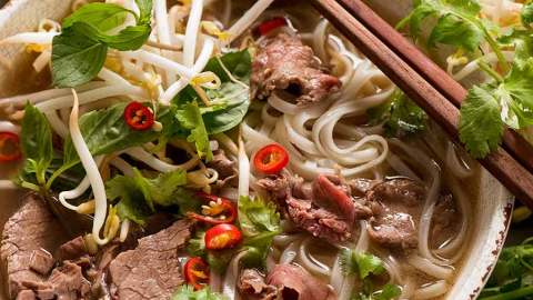 Beef Pho in a bowl, ready to be eaten