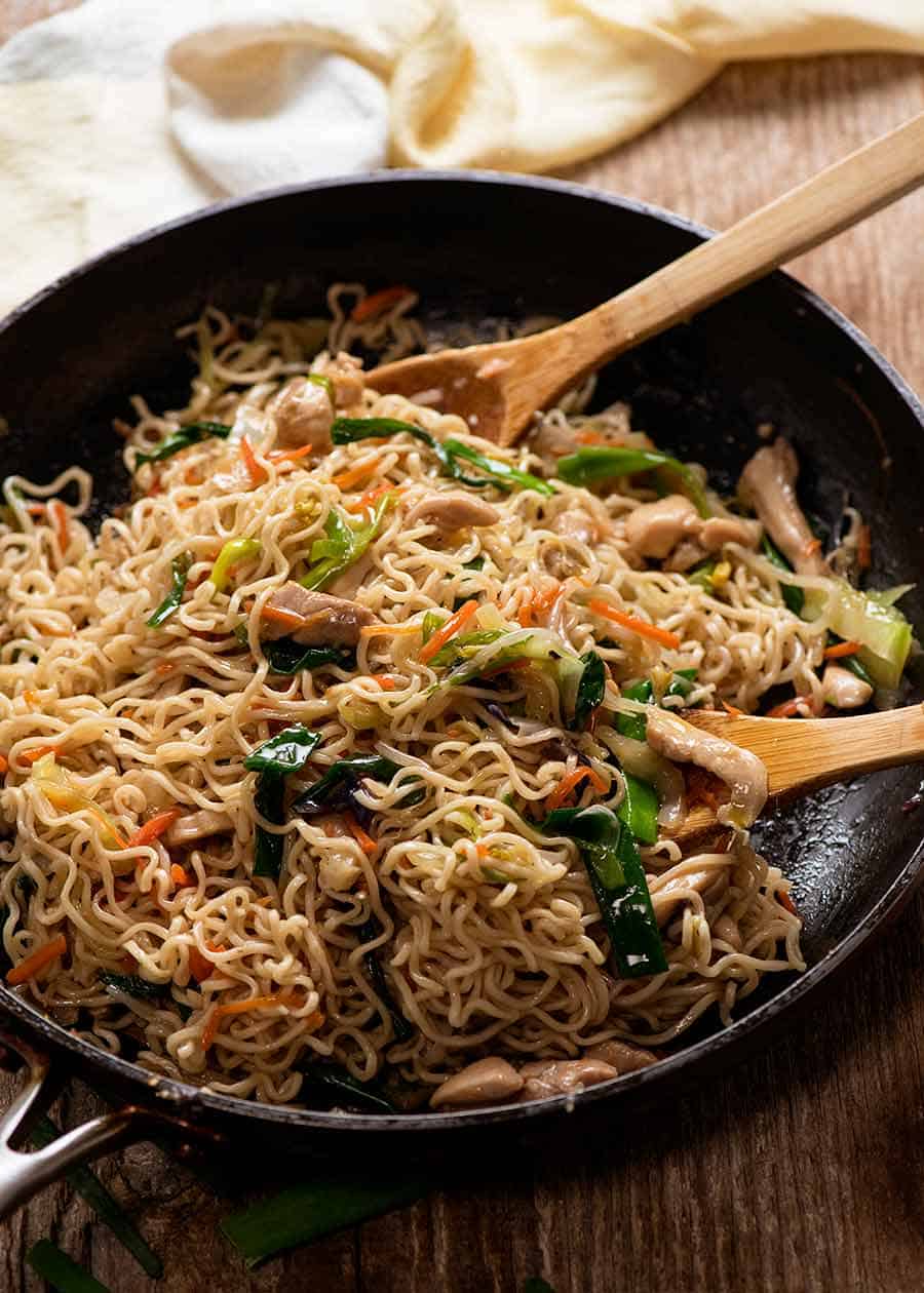 Freshly cooked Easy Chow Mein Recipe in a black skillet, ready to be served.