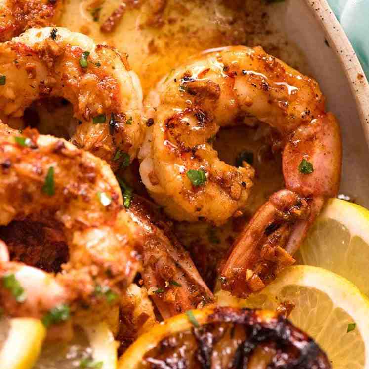 Close up of freshly cooked Crispy Grilled Shrimp with Lemon Garlic Butter Sauce on a plate, ready to be served