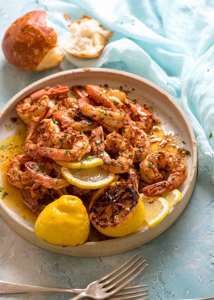 Crispy Grilled Shrimp with Lemon Garlic Butter Sauce with a side of crusty bread, ready to be eaten