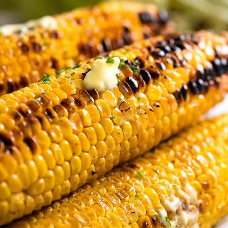 Stack of Grilled Corn with melting butter