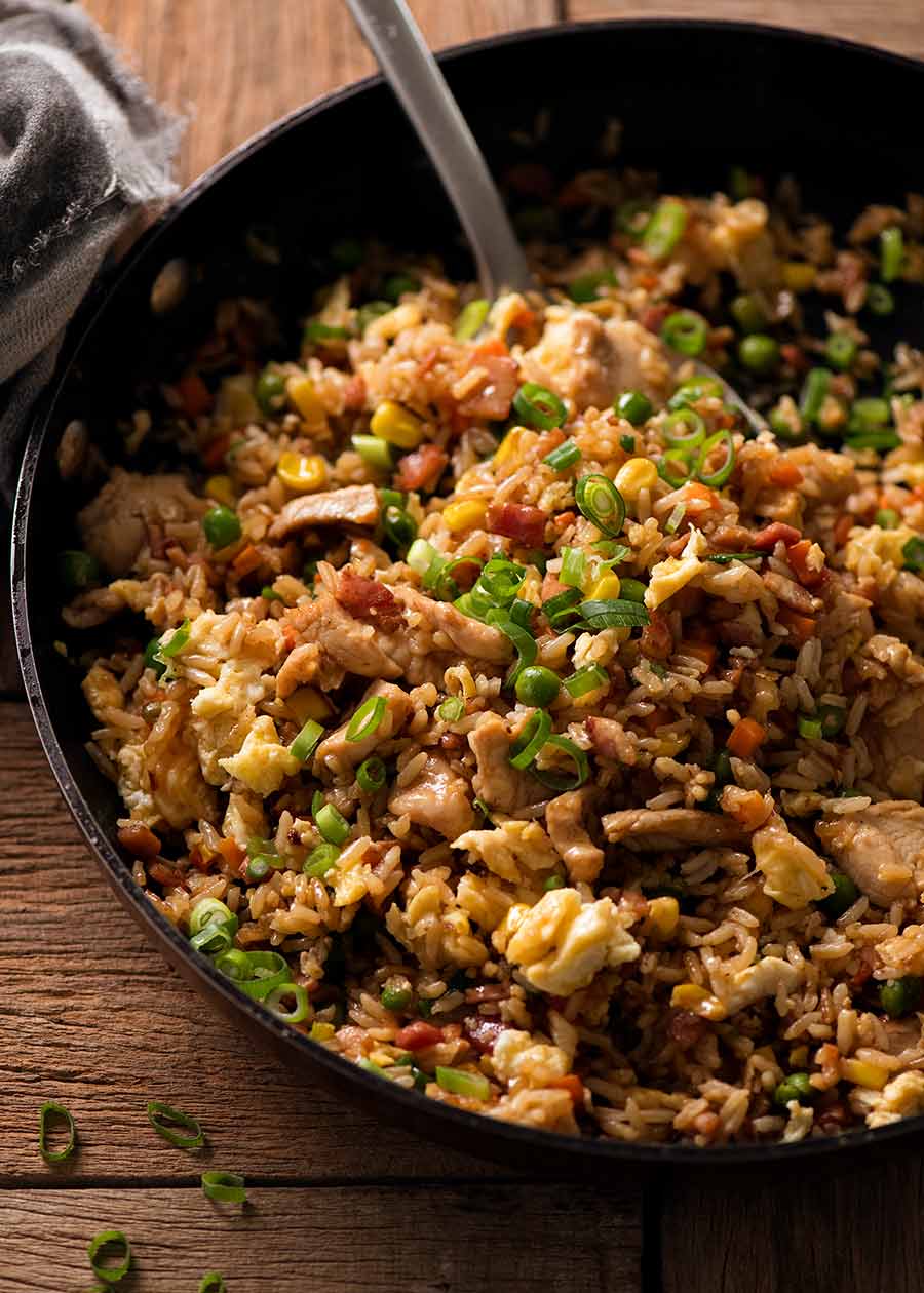 Chicken Fried Rice in a black skillet, fresh off the stove